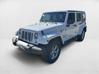 Used 2014 Jeep Wrangler Unlimited Sahara w/ Dual Top Group image 1