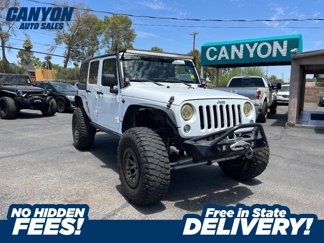 Used 2015 Jeep Wrangler Unlimited Sahara image 1