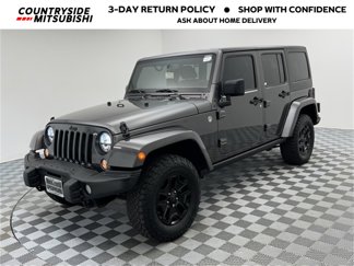 Used 2016 Jeep Wrangler Unlimited Sahara image 1