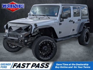 Used 2016 Jeep Wrangler Unlimited Sahara image 1