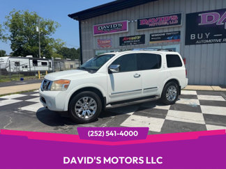 Used 2015 Nissan Armada Platinum w/ 2nd Row Captain Seat Package image 1
