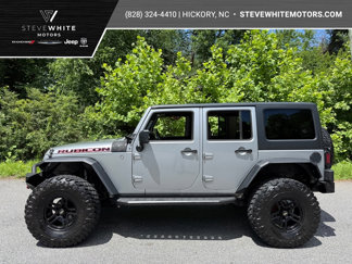 Used 2014 Jeep Wrangler Unlimited Rubicon w/ Dual Top Group image 1