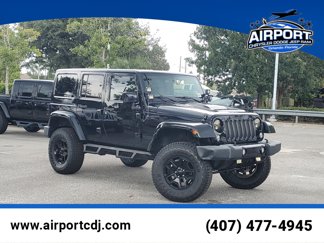 Used 2015 Jeep Wrangler Unlimited Sahara image 1
