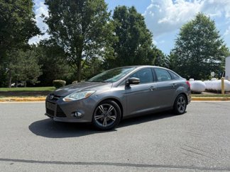 Used 2014 Ford Focus SE w/ SE Sport Package image 1