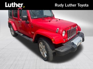 Used 2014 Jeep Wrangler Unlimited Sahara w/ Dual Top Group image 1