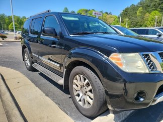 Used 2012 Nissan Pathfinder LE image 1