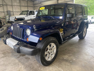 Used 2013 Jeep Wrangler Unlimited Sahara w/ Dual Top Group image 1