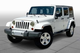 Used 2010 Jeep Wrangler Unlimited Sahara w/ Dual Top Group image 1