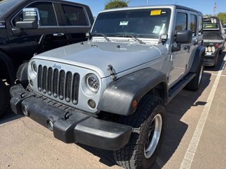Used 2012 Jeep Wrangler Unlimited Sport w/ Black Appearance Group image 1