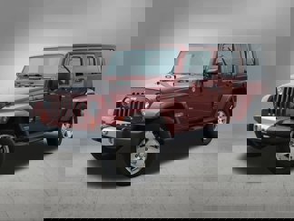 Used 2009 Jeep Wrangler Unlimited Sahara w/ Dual Top Group image 1