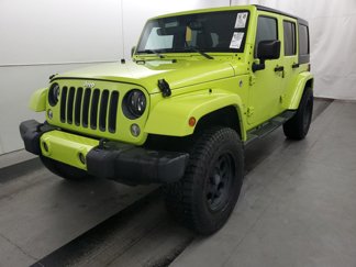 Used 2016 Jeep Wrangler Unlimited Sahara image 1