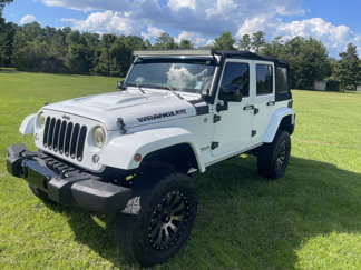 Used 2015 Jeep Wrangler Unlimited Sahara image 1