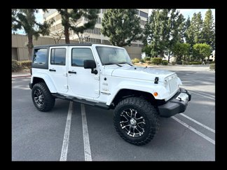 Used 2012 Jeep Wrangler Unlimited Sahara w/ Connectivity Group image 1