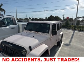 Used 2012 Jeep Wrangler Unlimited Sport image 1