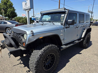 Used 2012 Jeep Wrangler Unlimited Sahara w/ Connectivity Group image 1
