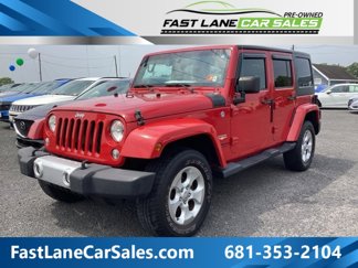 Used 2014 Jeep Wrangler Unlimited Sahara w/ Max Tow Package image 1