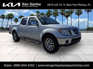 Used 2013 Nissan Frontier SL image 1