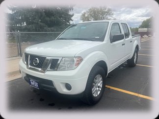 Used 2016 Nissan Frontier SV image 1