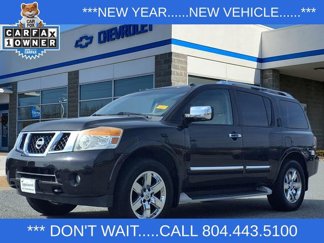 Used 2011 Nissan Armada Platinum w/ 2nd Row Captain Seat Pkg image 1