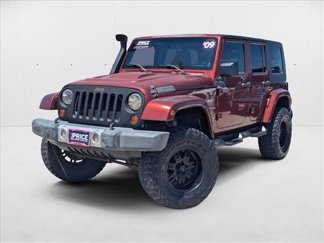 Used 2009 Jeep Wrangler Unlimited Sahara w/ Dual Top Group image 1