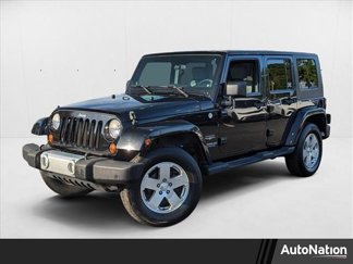 Used 2010 Jeep Wrangler Unlimited Sahara w/ Trailer Tow Group image 1