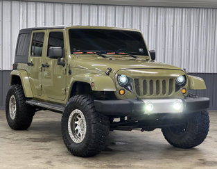 Used 2013 Jeep Wrangler Unlimited Sahara w/ Dual Top Group image 1
