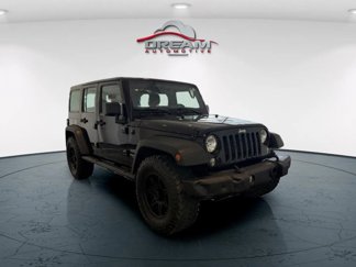 Used 2016 Jeep Wrangler Unlimited Sport w/ Mopar Black Appearance Group image 1