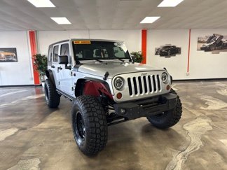 Used 2010 Jeep Wrangler Unlimited Sport image 1
