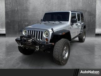 Used 2012 Jeep Wrangler Unlimited Sport image 1