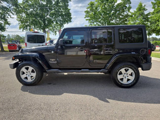 Used 2012 Jeep Wrangler Unlimited Sahara w/ Dual Top Group image 1