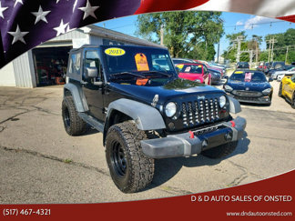 Used 2013 Jeep Wrangler Sport image 1