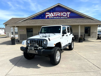 Used 2014 Jeep Wrangler Unlimited Sport image 1