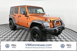 Used 2010 Jeep Wrangler Unlimited Sport image 1