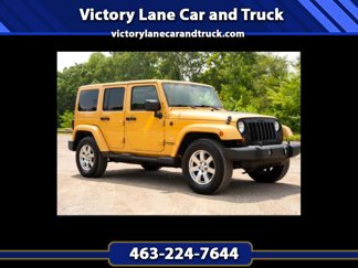 Used 2013 Jeep Wrangler Unlimited Sahara w/ Dual Top Group image 1