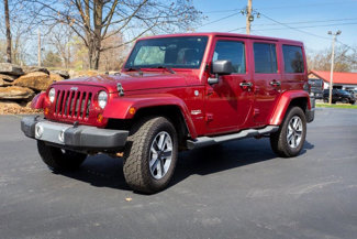 Used 2012 Jeep Wrangler Unlimited Sahara w/ Dual Top Group image 1