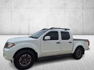 Used 2021 Nissan Frontier PRO-4X w/ Pro-4x Utility Package image 1