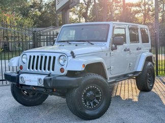 Used 2012 Jeep Wrangler Unlimited Sahara w/ Connectivity Group image 1