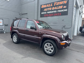 Used 2004 Jeep Liberty Limited w/ 17" Chrome Wheel & Tire Group image 1