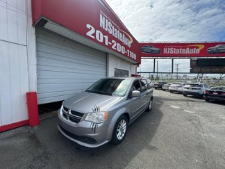 Used 2014 Dodge Grand Caravan SXT image 1