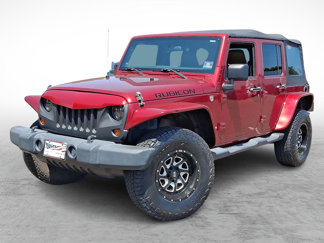 Used 2012 Jeep Wrangler Unlimited Rubicon w/ Dual Top Group image 1