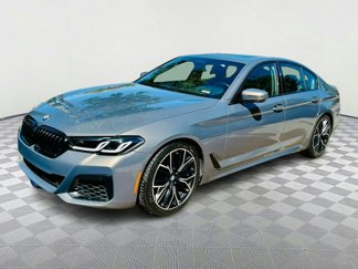 Used 2022 BMW M550i xDrive w/ Executive Package image 1