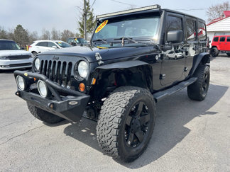 Used 2012 Jeep Wrangler Unlimited Sahara image 1