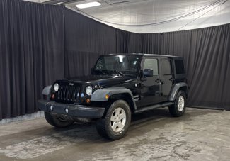Used 2011 Jeep Wrangler Unlimited Sport image 1