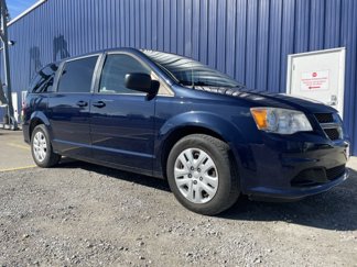 Used 2014 Dodge Grand Caravan SE image 1
