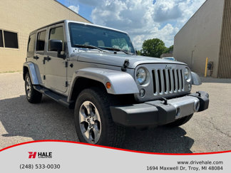 Used 2016 Jeep Wrangler Unlimited Sahara image 1