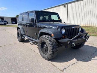 Used 2011 Jeep Wrangler Unlimited Rubicon w/ Dual Top Group image 1