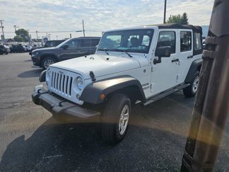 Used 2016 Jeep Wrangler Unlimited Sport w/ Mopar Black Appearance Group image 1
