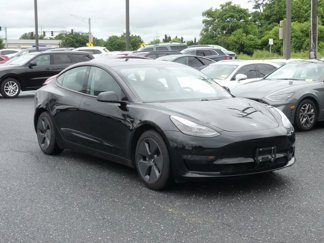 Used 2021 Tesla Model 3 Standard Range Plus image 1