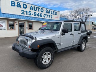 Used 2012 Jeep Wrangler Unlimited Sport w/ Black Appearance Group image 1