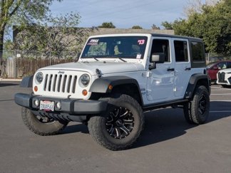 Used 2013 Jeep Wrangler Unlimited Sport image 1